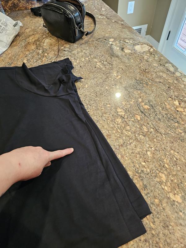 Way shorter than photo, almost crop/above waistband style