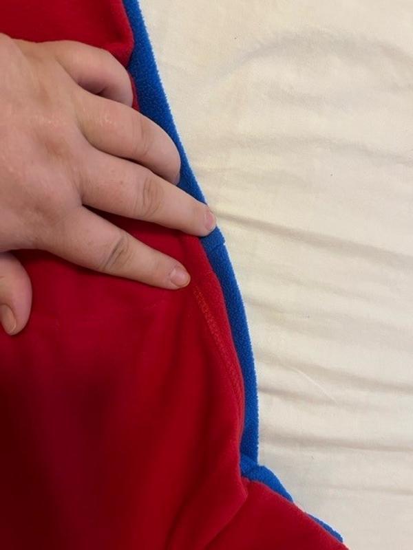 View of the shoulders not lining up, my fingers are next to the shoulder seams