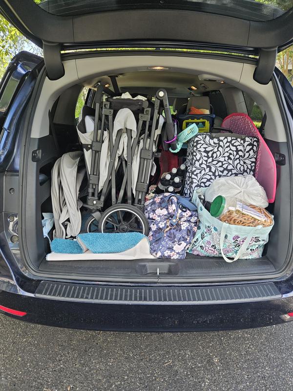 Standing up in the trunk with all our luggage