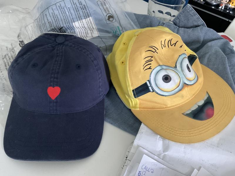 Junk Levi’s design adult hat vs universal studios kids hat…