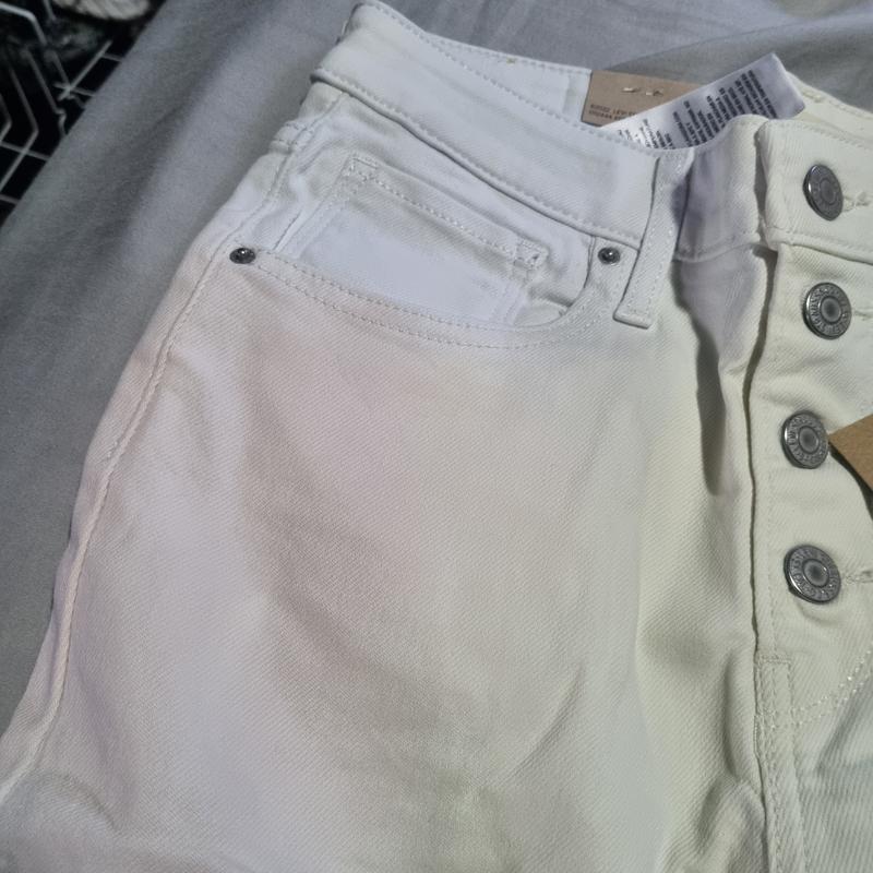 Look like you mistakenly put it to wash with color clothes