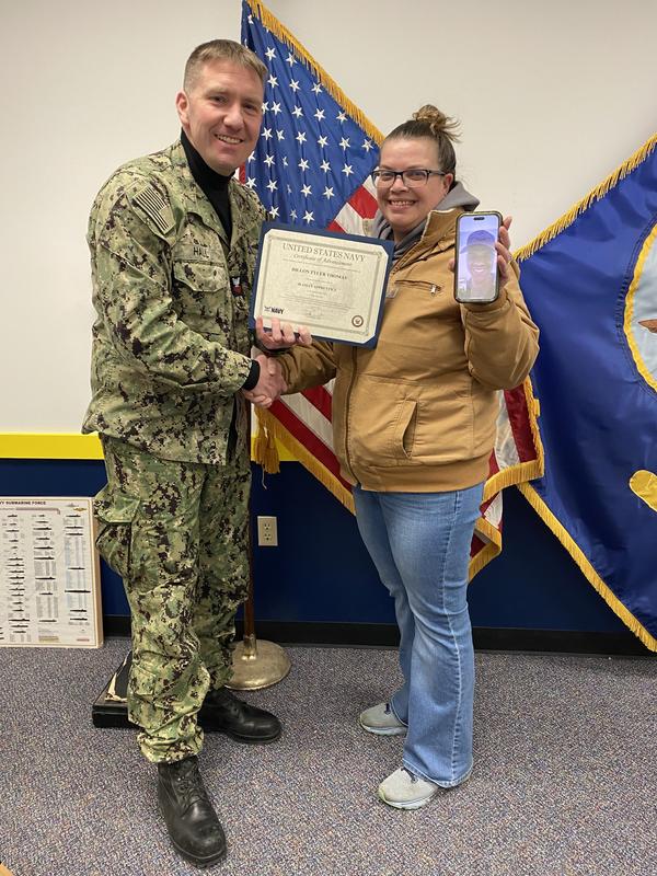 Me accepting a promotion for my son in the US Navy! With my Levi’s ❤️