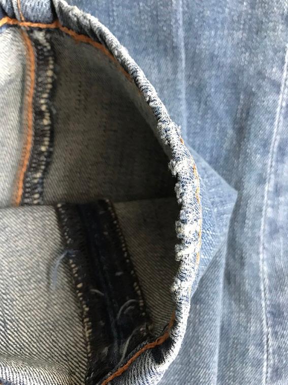 Frayed cuffs on both legs