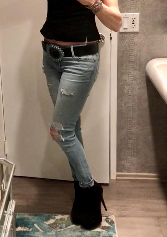 Ripped jeans with ankle boots