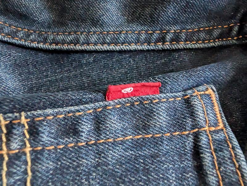 Levi name not visible on either side of the red tab