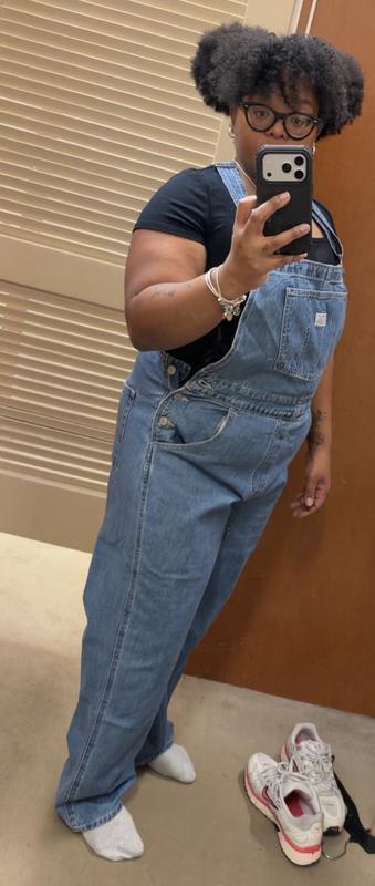 XL but a little tight around the mid section