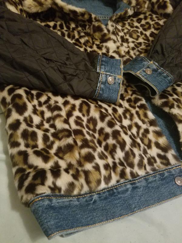 Defect: fur not past bottom seam, like the model has on in photo.