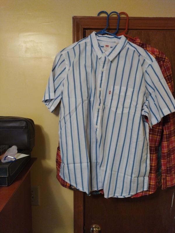 White and blue stripe down shirt.