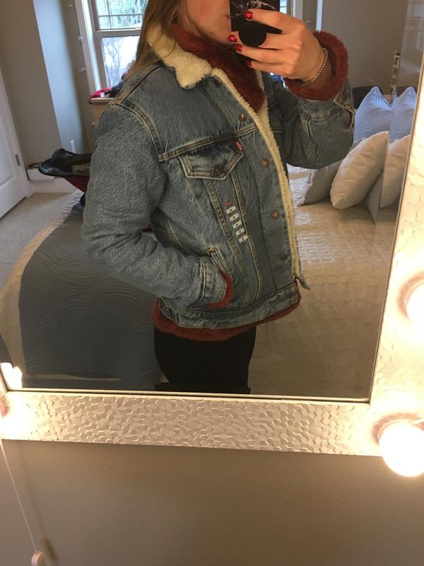 I am wearing a thick Sherpa underneath and the jacket still fits great!