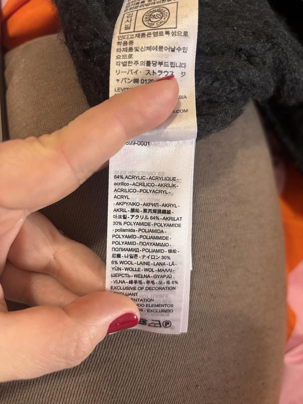 60% acrylic, 30% polyamide and 6% wool. This is not 100% cotton like it was advertised.