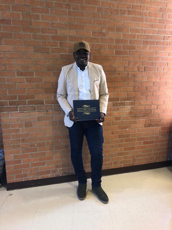 Wearing the luxury while getting presented a scholarship