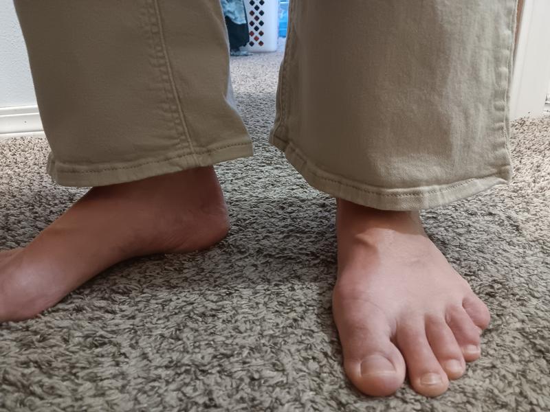 I try to press the hems flat when I fold them,  so they're is only a slight curl here,  but I think you can still see it.  This is a good picture of the length,  I wish I would have taken a picture before I washed them.