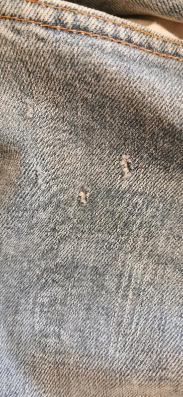 Holed jeans.