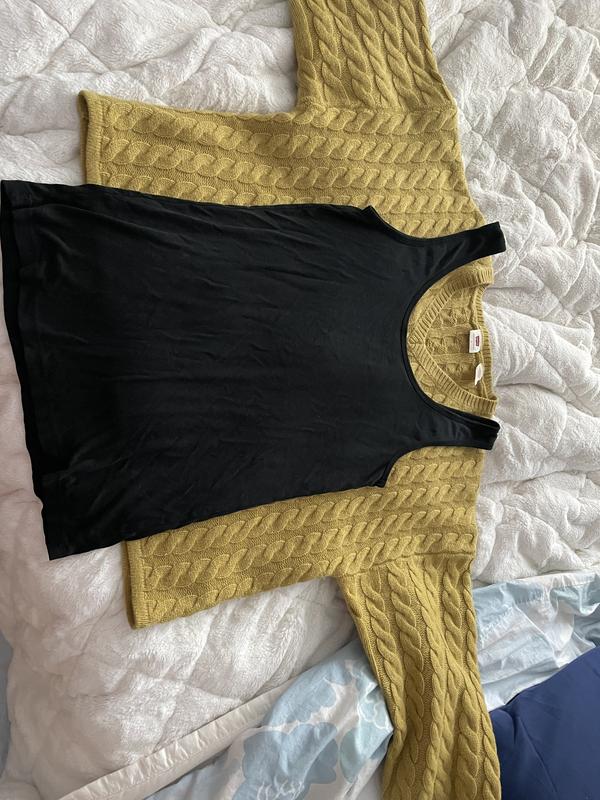 With a large baggy tank for reference