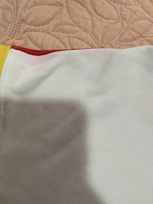 Red and blue stains the white
