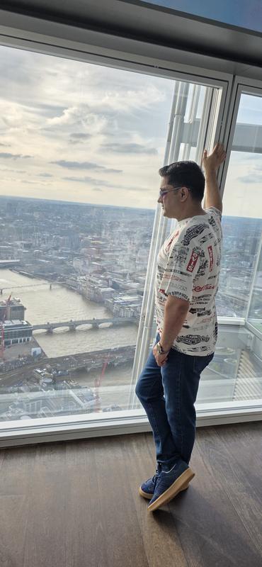 View from The Shard London in Levi's T-shirt and jeans.