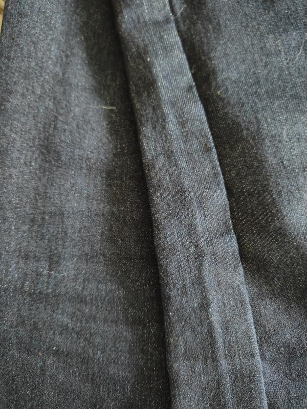Not double stitched in gold thread
