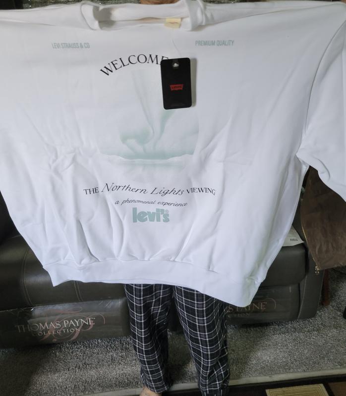 Me holding the shirt