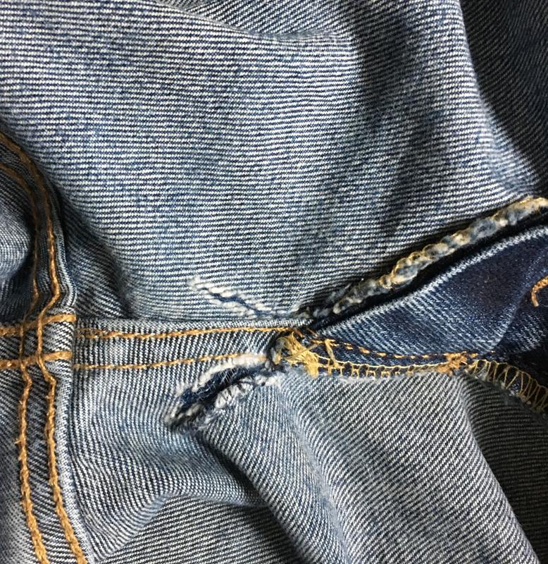1st pair (tearing below fly)