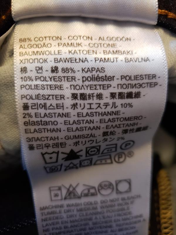 Tag from Dark Hallow colored jeans