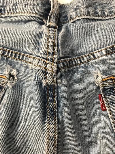 holes already in jeans.