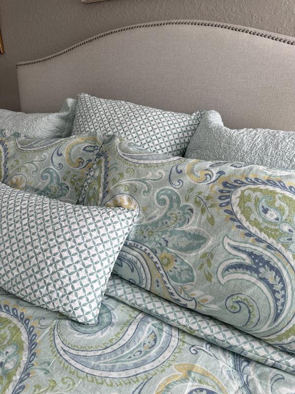 We ordered 2 sets of shams in contrasting patterns, plus an accent pillow, and used one of the shams as a cover for this.
