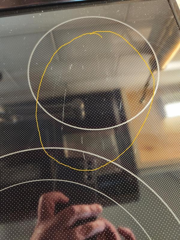 Scratches on my Porcelain Stovetop caused by an unglazed bottom of the Lasagna Pan by La Creuset.