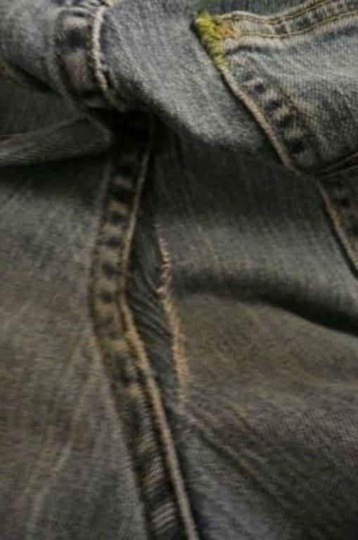 Rip in jeans. Note, the pocket was sewn also.