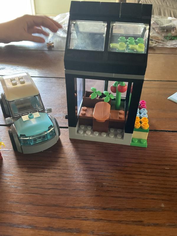 Our building expert started with the car and greenhouse, her favorite part