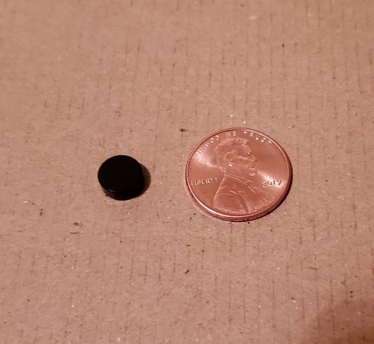 Very tiny . Is this black or dark brown? Number the bags. It is #15 dark brown.