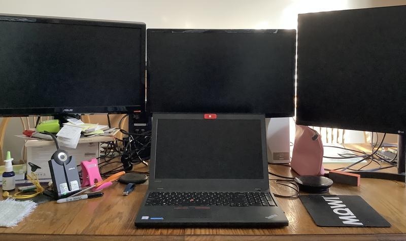 Dock is behind laptop in this photo