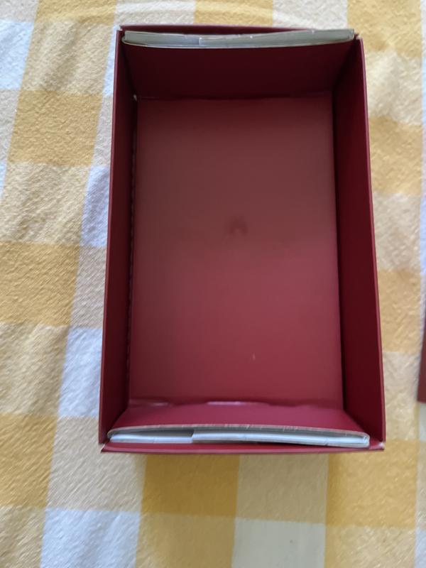 Pointless packaging. Lenox saves .05 cents and losses longtime collectors.
