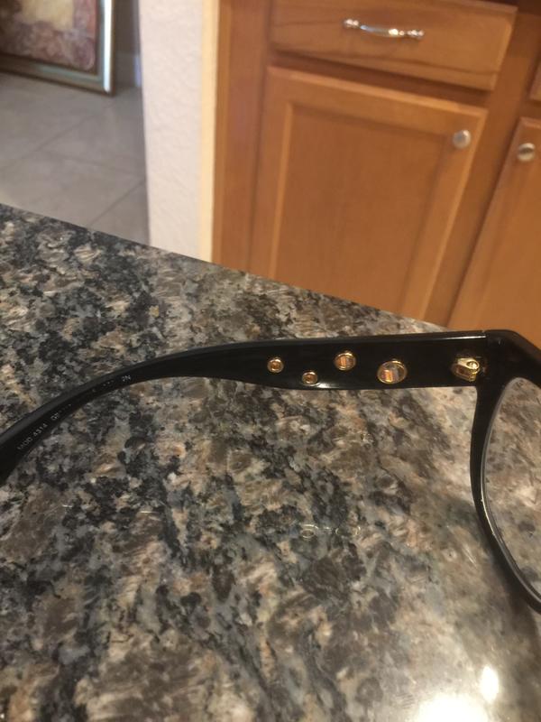 Versace name and the info on the arm of glasses fading