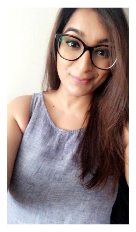 New glasses go with everything. Even dresses