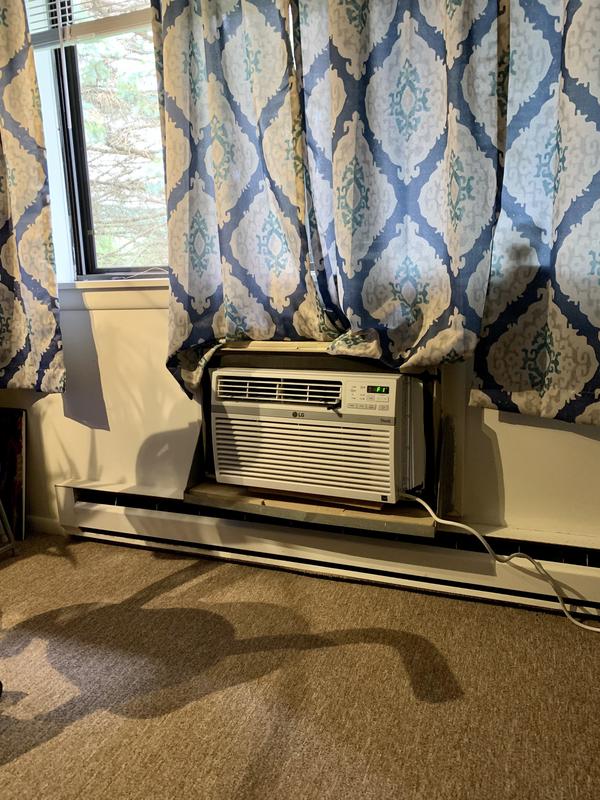 My LG air conditioner fits in a wall opening