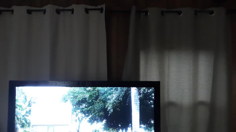 Can you tell which one is the darkening curtain.