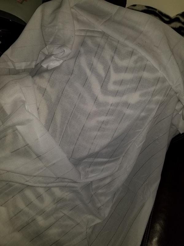 It's long, creamy white and feels very silky sheer