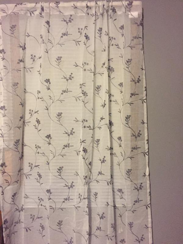 These curtains compliment the wall color very well