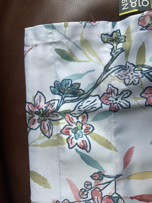 Pocket for curtain rod.