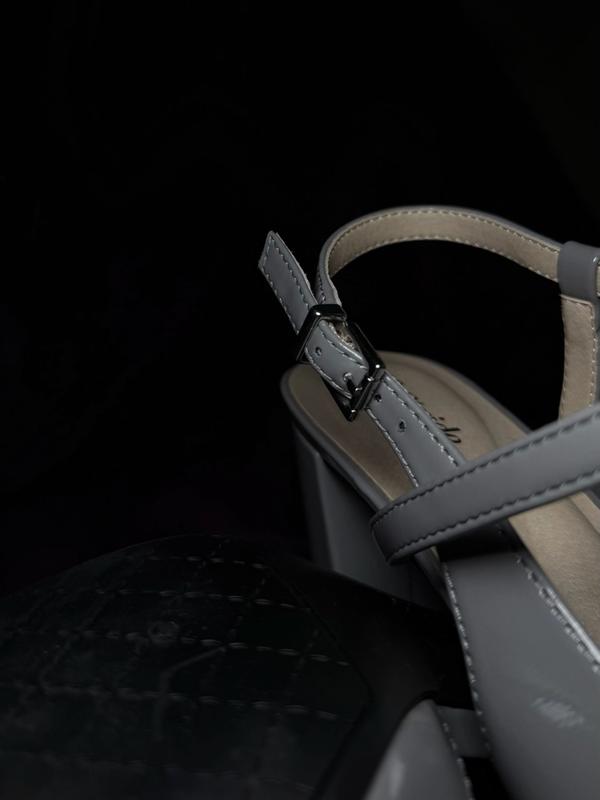 Customer photo for "Nicely made, stylish, but a bit narrow."