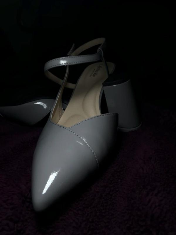 Customer photo for "Nicely made, stylish, but a bit narrow."