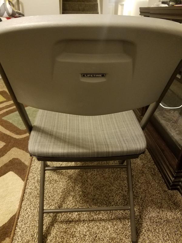 Handle in the plastic on back of chairs