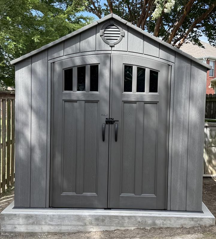 Leveled Concrete Slab. Shed anchored to slab.