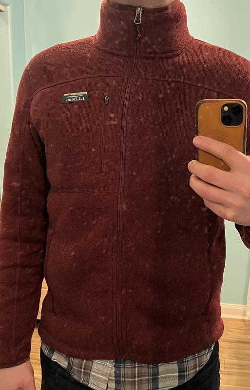 Customer photo for "Poor zipper stitching = weird fit"