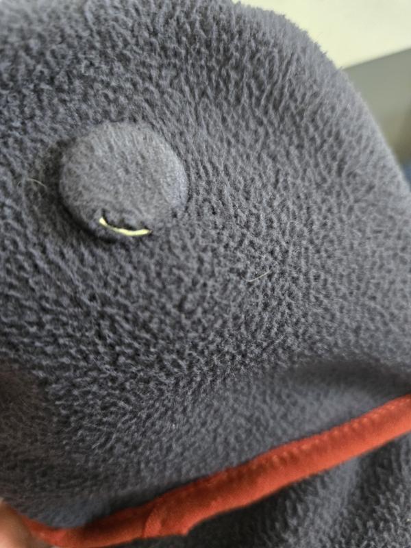 Top magnet is still in place, but you can see where material is ripping.