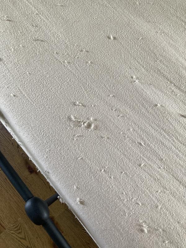 Lint from use under top sheet and on top of fitted sheet.