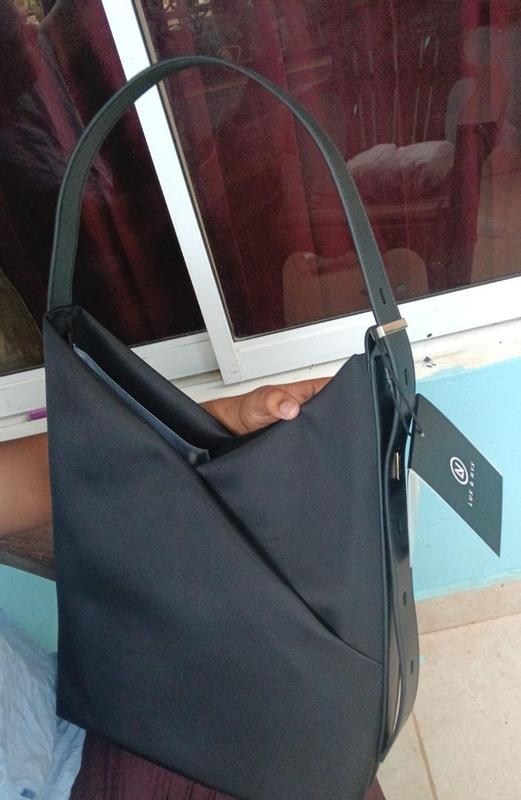 Customer photo for "A stylish, durable,  and practical bag that is perfect for everyday use."