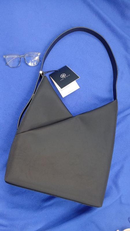 Customer photo for "A stylish, durable,  and practical bag that is perfect for everyday use."