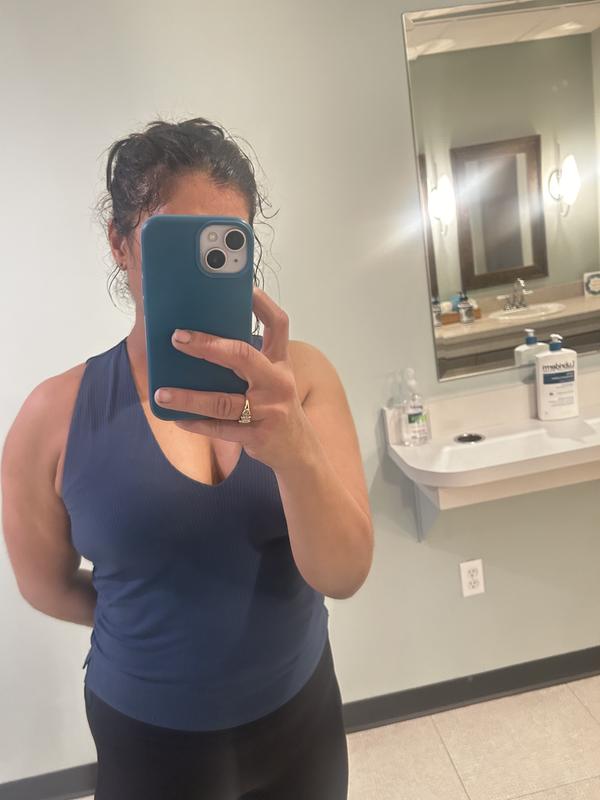 Every time I wear it to a yoga class someone compliments it. I wear a size 10 usually and took a chance with 12. It's ruched. Forgiving. Flattering. And the PERFECT length! 🙌