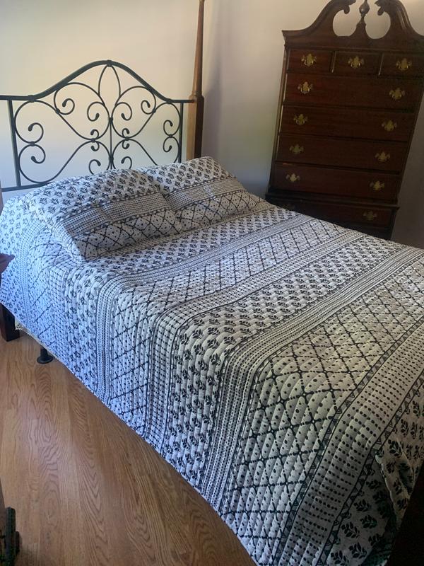 generous overhang on full-size bed.
